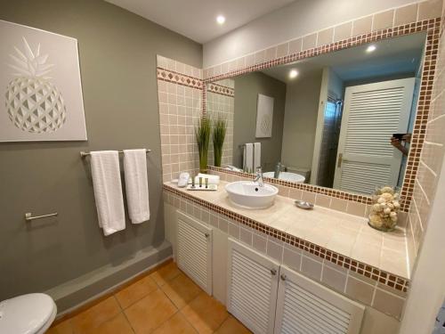Reves de Tropiques - Grands studios vue ocean acces plage direct