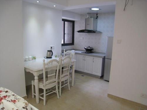 Sanya Wen Xin Hai Jing Apartement - Photo 4