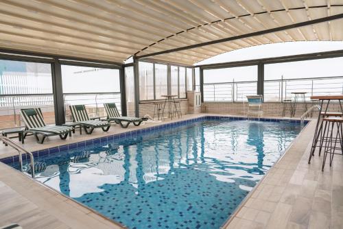 Peldbaseins, Noor Land Hotel in Baghdad