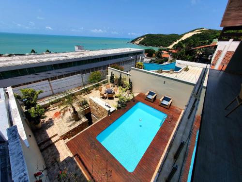 Casa Áurea! A 100 metros da areia de Ponta Negra, com vista deslumbrante do mar