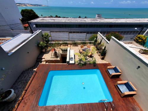 Casa Áurea! A 100 metros da areia de Ponta Negra, com vista deslumbrante do mar