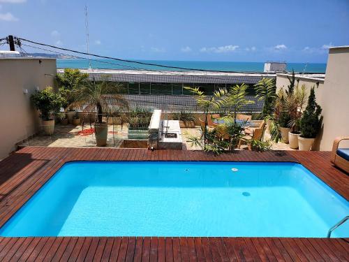 Casa Áurea! A 100 metros da areia de Ponta Negra, com vista deslumbrante do mar