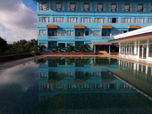 Swimming pool, Taksila Hotel in Mahasarakham