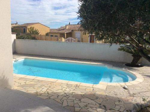 Peldbaseins, Villa Ancolie climatisée avec piscine chauffée de mai à septembre (Villa Ancolie climatisee avec piscine chauffee de mai a septembre) in Magalas