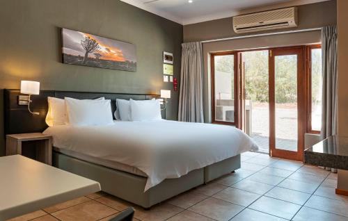 Upington INN - Tap to explore photos