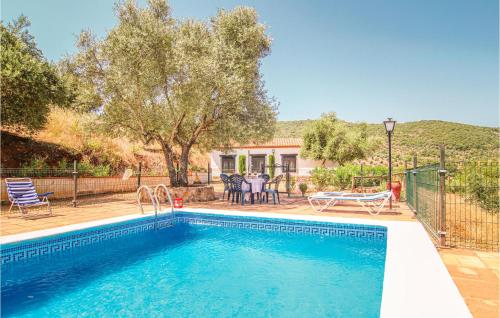 . Awesome home in Villanueva del Rey with 4 Bedrooms and Outdoor swimming pool