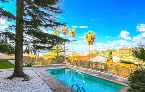 Nice home in Malaga with Outdoor swimming pool, WiFi and 6 Bedrooms