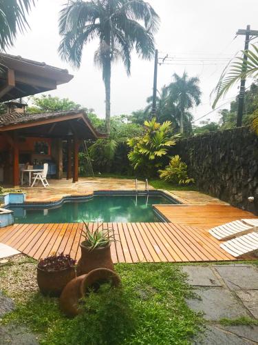 Casa 5 suítes com piscina e churrasqueira