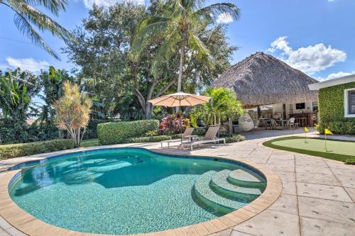 Poolside Paradise with Tropical Hut in Palm Beach