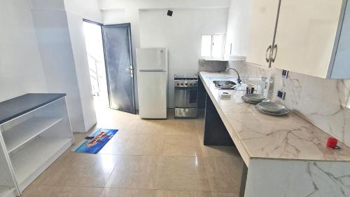 Kitchen, Casa Maya Playa El Yaque near Santiago Mariño Caribbean International Airport