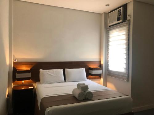 Seacliff Suites Hotel & Resort Room Type - Deluxe Double Room (2 Adults + 1 Child)