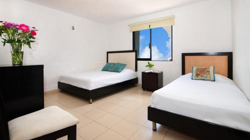Oceanfront white sand beach condo for families, Cancún (Foto 6)