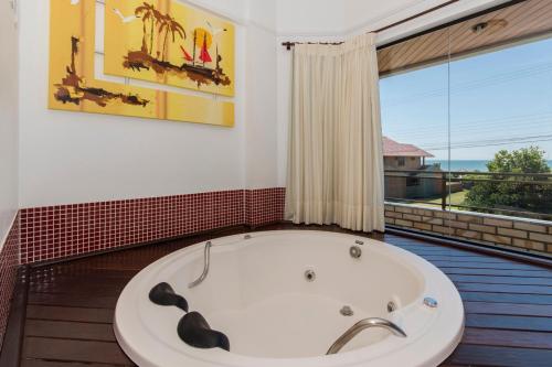 อ่างแช่น้ำร้อน, Raio do Sol Residence in บอมบิญาส