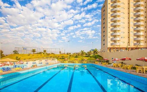 スイミングプール, HOTEL GOLDEN DOLPHIN RESORT - FLAT no DÉCIMO ANDAR quarto com varanda (HOTEL GOLDEN DOLPHIN RESORT - FLAT no DECIMO ANDAR quarto com varanda) in カルダス ノバス