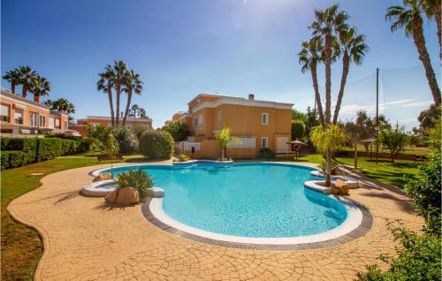 Awesome home in Playa san juan Alicant with Outdoor swimming pool, WiFi and 5 Bedrooms gîte à louer Alicante Golf