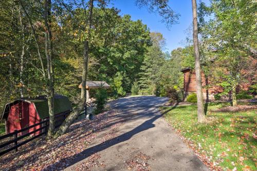 Rustic Dundee Log Cabin with Hot Tub and Forest Views!