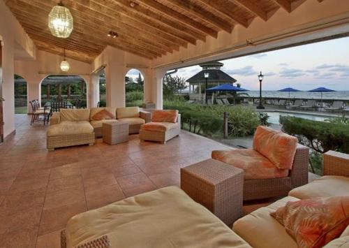 Luxurious Beach Front Villa with 5 Staff and Private Coach and Driver