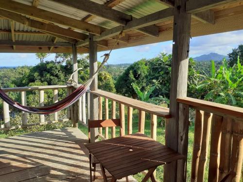 Balcony/terrace, Kiki's Nature Cabin in Calibishie