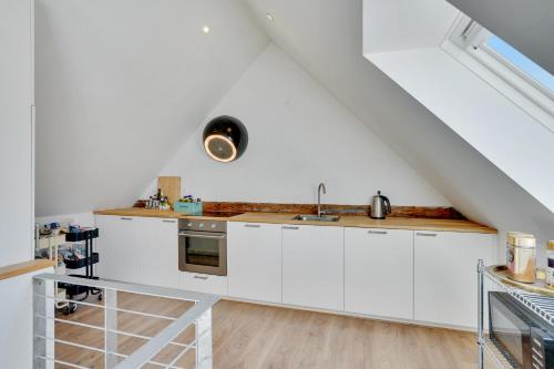 Kitchen, Bath tub penthouse in the city in Ogadekvarteret