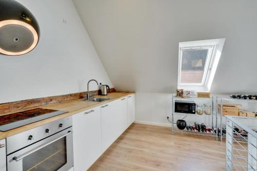 Kitchen, Bath tub penthouse in the city in Ogadekvarteret