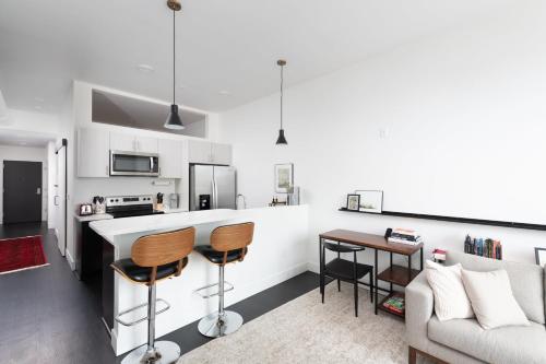 Flexhome Skywalk to Fiserv U2 with Rooftop Gym Parking in Milwaukee, USA