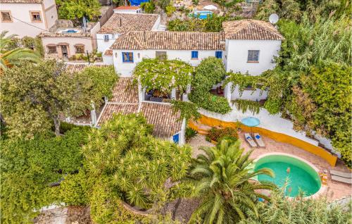  Nice home in Montecorto with Outdoor swimming pool, WiFi and 4 Bedrooms in Montecorto