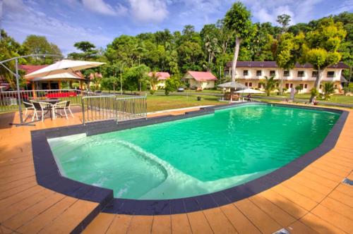 Swimming pool, TELUK PENYABUNG RESORT in Penyabong