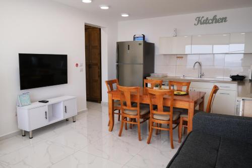 Κοινόχρηστο σαλόνι/χώρος τηλεόρασης, SleepWell Suite in Μαγντέλ Σαρμ