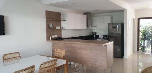 GARDENS VIEW DUPLEX CON PARRILERO y CRYSTAL BEACH in Solanas