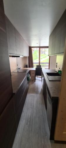 Kitchen, Centre Station: Altineige Cosy Appart pour 4 in Saint-Martin-de-Belleville