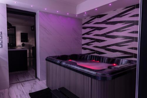 Appart Hotel GLAM88 Suites avec SPA et Sauna Privatif