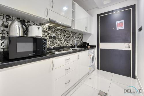 Radiant Studio at Giovanni Boutique Suites DSC by Deluxe Holiday Homes, Dubaj (fotografie 5)