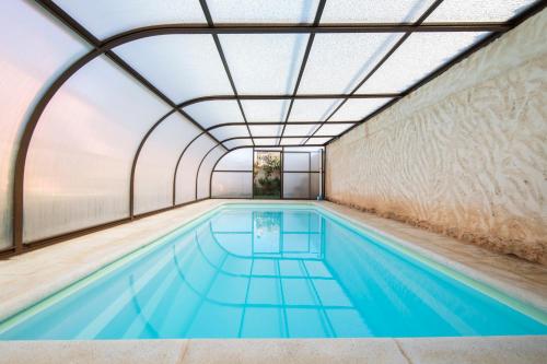Peldbaseins, La Ren Lecrés Apartamento piscina jardin (La Ren Lecres Apartamento piscina jardin) in Vadocondes