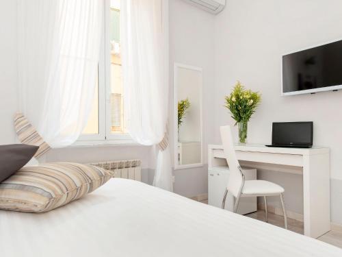 Foto - White Rooms Colosseo