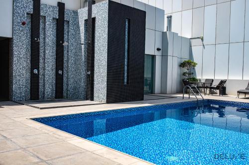Captivating Studio at Giovanni Boutique Suites DSC by Deluxe Holiday Homes