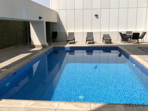 Captivating Studio at Giovanni Boutique Suites DSC by Deluxe Holiday Homes, Dubai (foto 6)