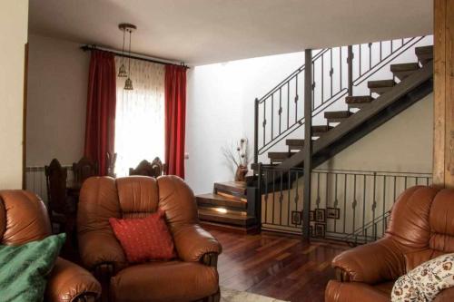 Koplietošanas atpūtas telpa ar TV, Casa Rural Paco in Munogalindo