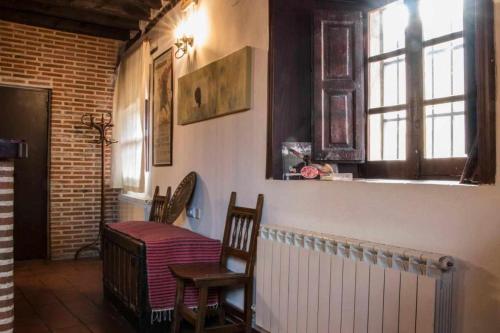 Koplietošanas atpūtas telpa ar TV, Casa Rural Paco in Munogalindo