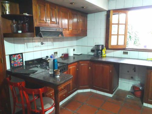 Kitchen, Tanino Guest House in Mendoza