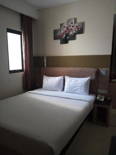 Bed, Penthouse hotel in Mangga Besar
