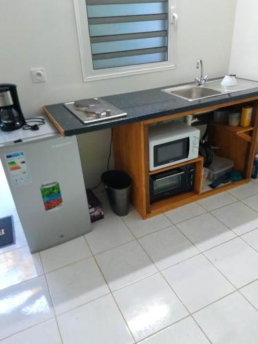 Cozinha, Bungalow charmant à Petit-Bourg avec jardin privé (Bungalow charmant a Petit-Bourg avec jardin prive) in Petit-Bourg