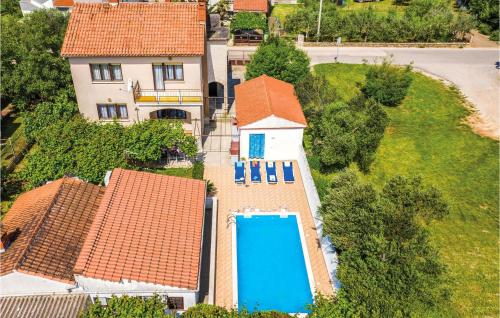 Awesome home in Stinjan with 4 Bedrooms, WiFi and Outdoor swimming pool - Štinjan