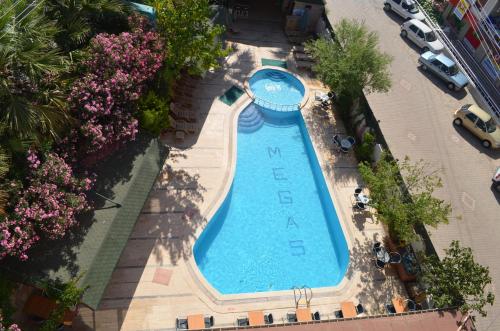 Megas Hotel Megas Hotel is a popular choice amongst travelers in Ayvalik, whether exploring or just passing through. Featuring a complete list of amenities, guests will find their stay at the property a comfortab