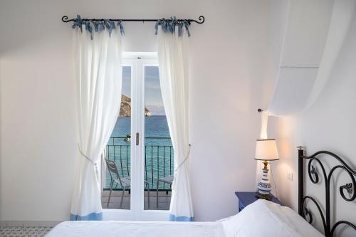 Suite Junior avec Balcon et Terrasse - Vue sur Mer