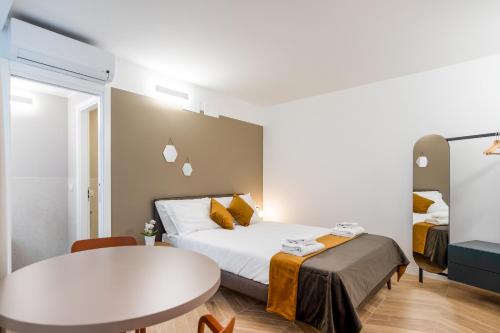 JOIVY Premium Apartments - Trieste Mazzini Room Type - Studio with Courtyard View