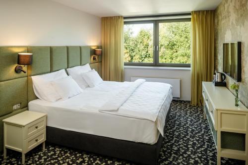 HERBARIUM boutique hotel Room Type - Deluxe Double Room (2 Adults + 1 Child) HERBARIUM boutique hotel Room Type - Deluxe Double Room (2 Adults + 1 Child)