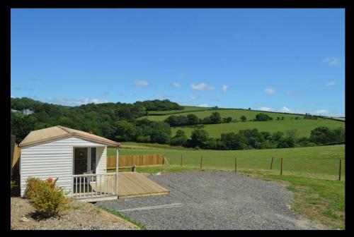 Private country caravan surrounded by fields
