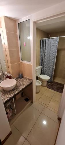 Moderno departamento de 1 dormitorio en edificio Centrico con estacionamiento privado.