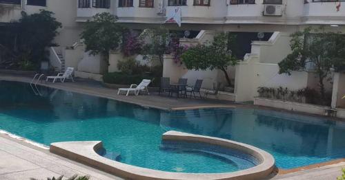 Trendy condo best location with washer near Maya mall
