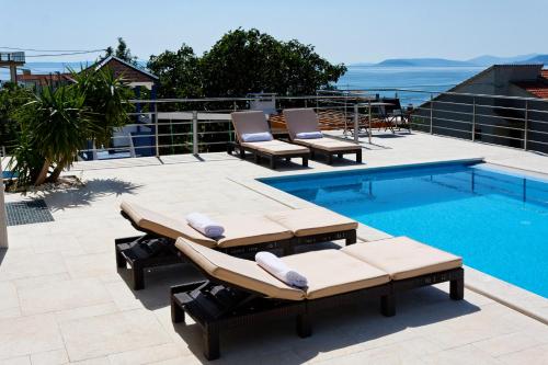 Villa Mermaid Villa Mermaid is a popular choice amongst travelers in Podstrana, whether exploring or just passing through. The hotel offers guests a range of services and amenities designed to provide comfort and c